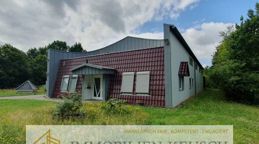 Besondere Gewerbeimmobilie mit 2 Lagerhallen, Außenflächen, Werkstatt + 85qm Büro
